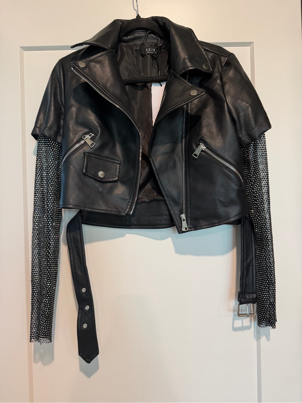 AKIRA Black Faux Leather Moto Jacket with Chain Fringe Sleeves